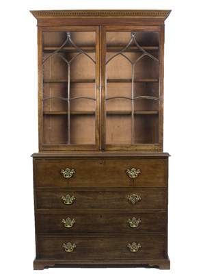 Lot 709 - A George III mahogany secretaire bookcase, the...