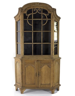 Lot 767 - A 19th Century Dutch oak cabinet, the arched...