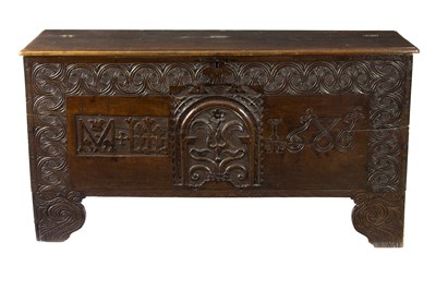 Lot 772 - A James II carved oak chest, the later moulded...