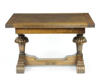 Lot 777 - A 17th Century style oak draw leaf dining...