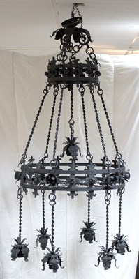 Lot 782 - An Italian wrought iron seven-light chandelier,...