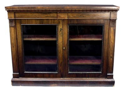 Lot 790 - A Regency rosewood side cabinet, the top with...