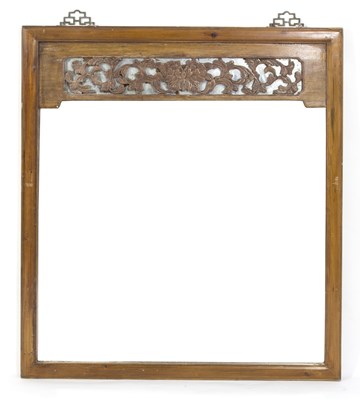 Lot 800 - A Chinese wall mirror with pierced carved...