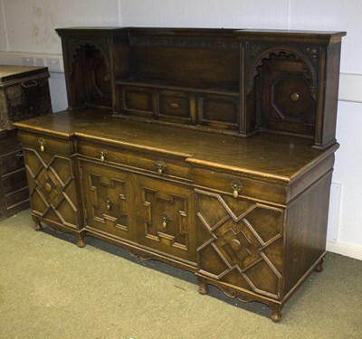 Lot 803 - A 17th Century style oak breakfront dresser...