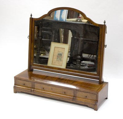 Lot 819 - A walnut and feather banded dressing table...