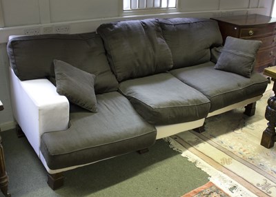 Lot 820 - An upholstered three-seat sofa