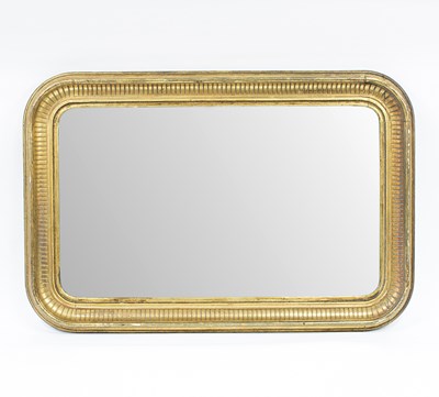 Lot 829 - A Victorian gilt framed mirror, the concave...