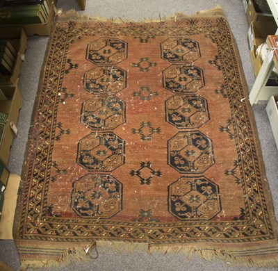 Lot 850 - A Caucasian rug with field of ten medallions,...