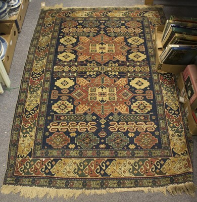 Lot 851 - An Eastern rug with allover geometric field,...