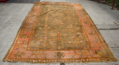 Lot 855 - A Turkey carpet with allover stylised floral...