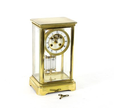 Lot 865 - A four-glass regulator in a gilt brass case,...