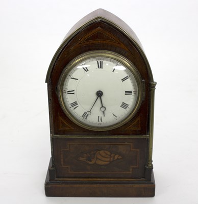 Lot 870 - An Edwardian mantel clock, the inlaid arch top...