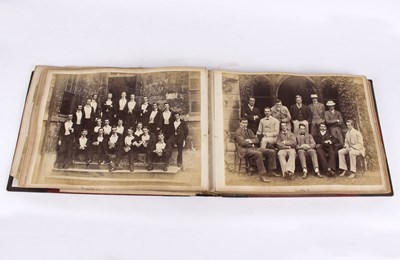 Lot 136 - A Victorian photograph album with half leather...