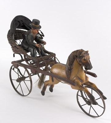 Lot 237 - A Victorian style model carriage with figure...