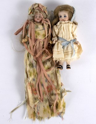 Lot 246 - An early 20th Century miniature doll with...