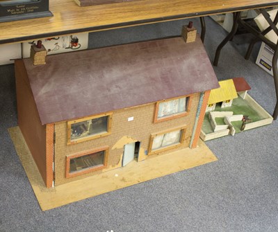 Lot 247 - A hand built dolls house, 77cm wide, with...