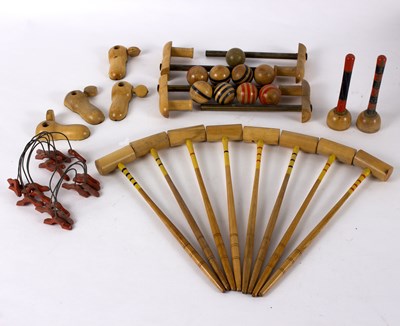 Lot 256 - A miniature indoor wooden croquet set for...