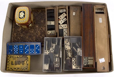 Lot 261 - A quantity of various domino sets and a tooled...