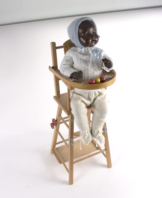 Lot 273 - A BND black composition doll, with sleepy eyes,...