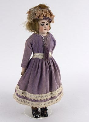 Lot 276 - A German bisque head doll, with sleepy eyes,...