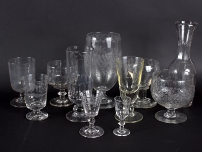 Lot 294 - An engraved glass vase, a carafe and various...