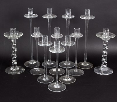 Lot 297 - A pair of glass candlesticks, the columns of...