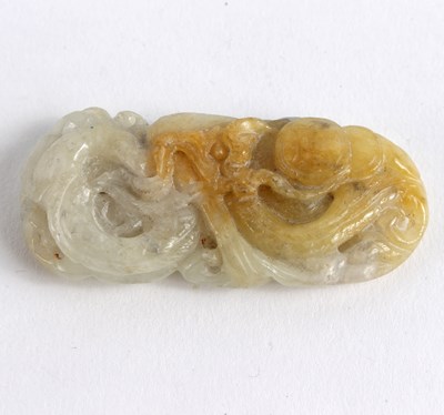 Lot 349 - A small carved jade pendant, depicting a...