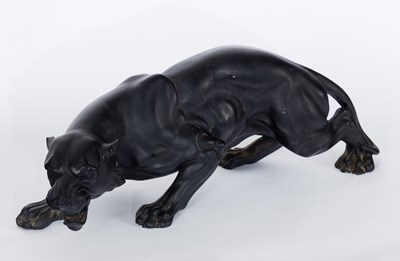 Lot 353 - A carved model of a panther, carved from...