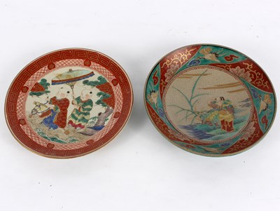 Lot 369 - Two Oriental porcelain plates each decorated...