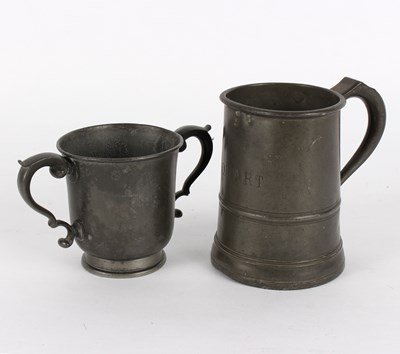 Lot 393 - A pewter loving cup and a quart pewter mug,...