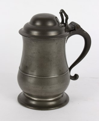 Lot 394 - A quart pewter lidded tankard, Bush and...