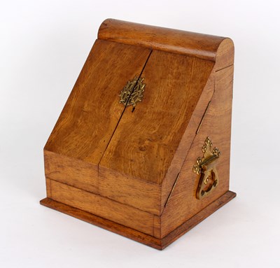 Lot 422 - A Victorian oak and brass mounted stationery...