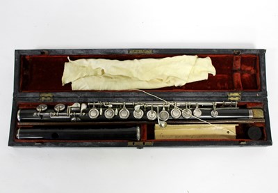 Lot 436 - A rosewood flute by Howarth, London, cased