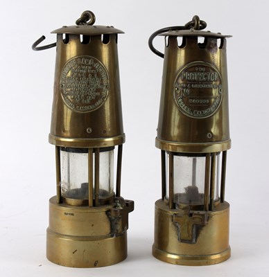 Lot 443 - Two miner's lamps, both 'The Protector',...