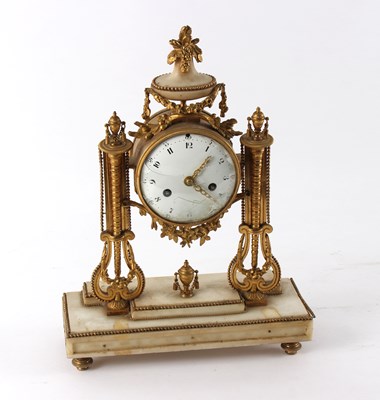 Lot 470 - A French gilt metal mounted mantel clock, the...