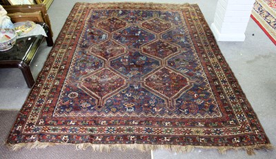 Lot 486 - A Hamadan rug with twin triple pole medallions...