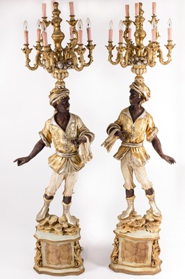 Lot 501 - A pair of floor standing blackamoors, each...