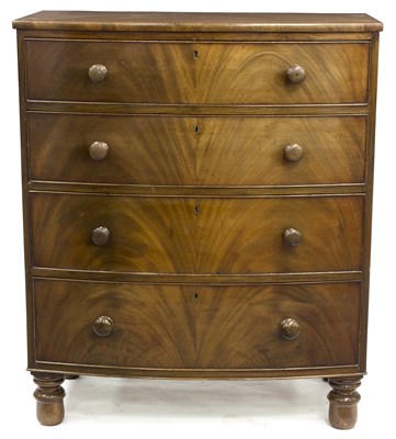 Lot 516 - An early 19th Century mahogany bowfront chest,...