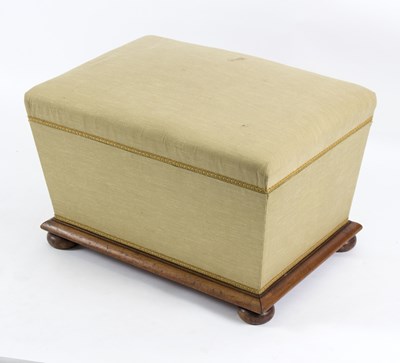 Lot 520 - A Victorian upholstered ottoman, on bun feet,...