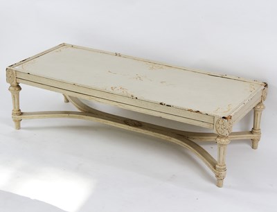 Lot 524 - A painted coffee table, 130cm x 54cm