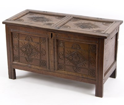 Lot 536 - An 18th Century oak chest, carved lozenges to...