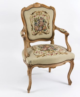 Lot 541 - A beech framed fauteuil with floral needlework...