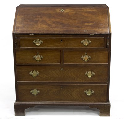 Lot 542 - A George III mahogany bureau with fitted...