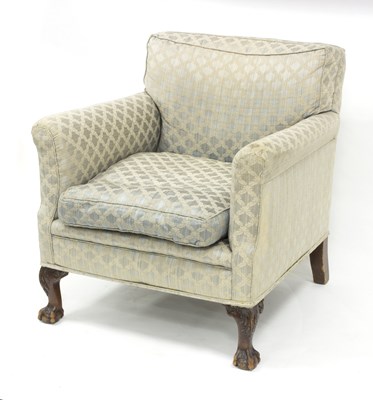 Lot 548 - An upholstered armchair on carved legs, with...