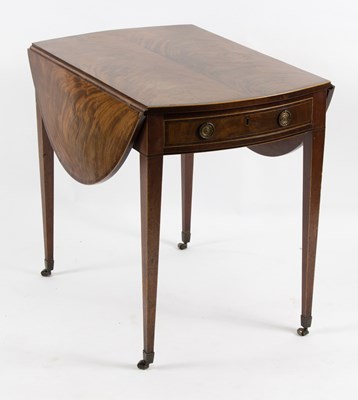 Lot 557 - A George III mahogany Pembroke table, the oval...