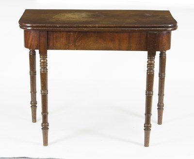 Lot 574 - A 19th Century mahogany card table on turned...