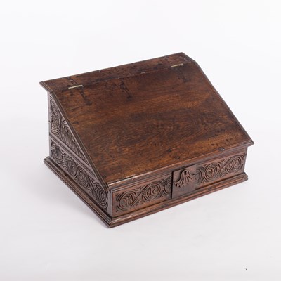 Lot 576 - An 18th Century oak Bible box, with sloping...