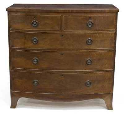 Lot 580 - A 19th Century mahogany bowfront chest, two...