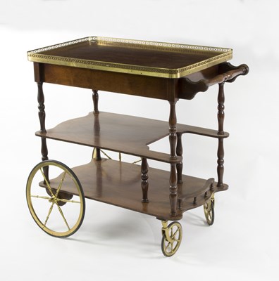 Lot 592 - A 20th Century tea trolley with pierced...