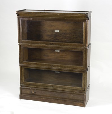 Lot 982 - An oak Globe Wernicke bookcase of three glazed...